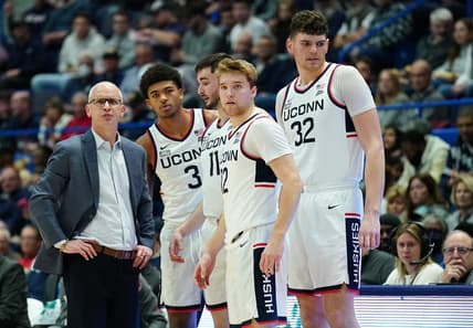 Nov 11, 2023; Hartford, Connecticut, USA; UConn Huskies head coach Dan Hurley talks with forward Jaylin Stewart (3), forward Alex Karaban (11), center Donovan Clingan (32) and guard Cam Spencer (12) from the sideline as they take on the Stonehill Skyhawks at XL Center. Mandatory Credit: David Butler II-USA TODAY Sports