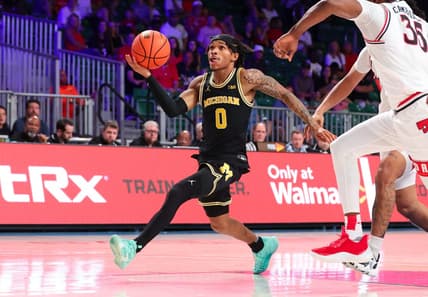 Nov 24, 2023; Paradise Island, BAHAMAS;  Michigan Wolverines guard Dug McDaniel (0) shoots during the second half against the Texas Tech Red Raiders at Imperial Arena. Mandatory Credit: Kevin Jairaj-USA TODAY Sports