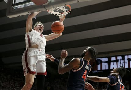 Jan 24, 2024; Tuscaloosa, Alabama, USA; Alabama Crimson Tide forward Grant Nelson (2) makes a dunk late in the game over Auburn Tigers center Johni Broome (4) at Coleman Coliseum. Mandatory Credit: Gary Cosby Jr.-USA TODAY Sports