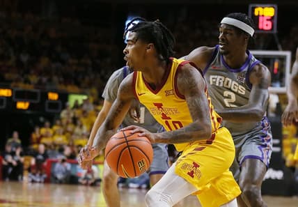 Iowa State Cyclones guard Keshon Gilbert (10) drives around TCU Horned Frogs forward Emanuel Miller (2) during the first half in the Big-12 conference showdown of a NCAA college basketball at Hilton Coliseum on Saturday, Feb. 10, 2024, in Ames, Iowa.