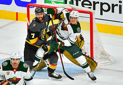 May 24, 2021; Las Vegas, Nevada, USA; Vegas Golden Knights defenseman Alex Pietrangelo (7) battles for position against Minnesota Wild center Joel Eriksson Ek (14) in front of Vegas Golden Knights goaltender Marc-Andre Fleury (29) during the first period of game five of the first round of the 2021 Stanley Cup Playoffs at T-Mobile Arena. Mandatory Credit: Stephen R. Sylvanie-USA TODAY Sports