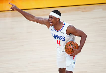 Jun 22, 2021; Phoenix, Arizona, USA; Los Angeles Clippers guard Rajon Rondo (4) reacts against the Phoenix Suns during game two of the Western Conference Finals for the 2021 NBA Playoffs at Phoenix Suns Arena. Mandatory Credit: Mark J. Rebilas-USA TODAY Sports