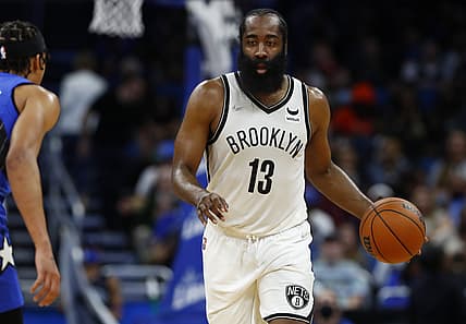 Nov 10, 2021; Orlando, Florida, USA;  Brooklyn Nets guard James Harden (13) dribbles the ball against the Orlando Magic during the second quarter at Amway Center. Mandatory Credit: Kim Klement-USA TODAY Sports