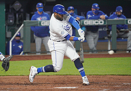 Apr 15, 2021; Kansas City, Missouri, USA; Kansas City Royals third baseman Hanser Alberto hits a two-run double in the fourth inning against the Toronto Blue Jays at Kauffman Stadium. Mandatory Credit: Denny Medley-USA TODAY Sports