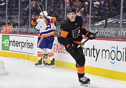 Apr 18, 2021; Philadelphia, Pennsylvania, USA;  Philadelphia Flyers defenseman Travis Sanheim (6) skates away as New York Islanders defenseman Nick Leddy (2) celebrates his game winning goal in overtime at Wells Fargo Center. Mandatory Credit: Eric Hartline-USA TODAY Sports