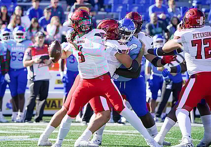 Oct 16, 2021; Lawrence, Kansas, USA; Texas Tech Red Raiders quarterback Henry Colombi (3) passes the ball against the Kansas Jayhawks during the first half at David Booth Kansas Memorial Stadium. Mandatory Credit: Denny Medley-USA TODAY Sports