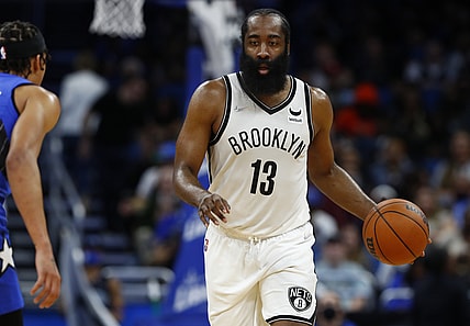 Nov 10, 2021; Orlando, Florida, USA;  Brooklyn Nets guard James Harden (13) dribbles the ball against the Orlando Magic during the second quarter at Amway Center. Mandatory Credit: Kim Klement-USA TODAY Sports