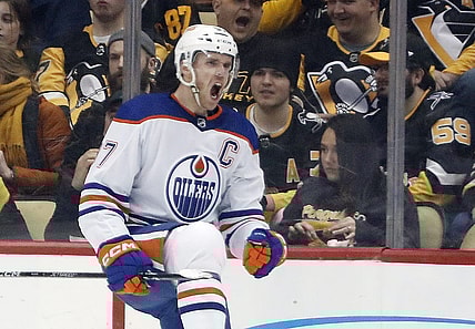 Feb 23, 2023; Pittsburgh, Pennsylvania, USA; Edmonton Oilers center Connor McDavid (97) reacts after scoring a goal against the Pittsburgh Penguins during the first period at PPG Paints Arena. Mandatory Credit: Charles LeClaire-USA TODAY Sports