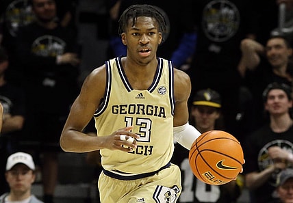 Feb 21, 2023; Pittsburgh, Pennsylvania, USA;  Georgia Tech Yellow Jackets guard Miles Kelly (13) brings the ball up court against the Pittsburgh Panthers during the first half at the Petersen Events Center. Mandatory Credit: Charles LeClaire-USA TODAY Sports