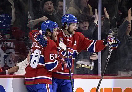 Mar 7, 2023; Montreal, Quebec, CAN; Montreal Canadiens forward Mike Hoffman (68) celebrates with teammate forward Josh Anderson (17) after scoring a goal against the Carolina Hurricanes during the first period at the Bell Centre. Mandatory Credit: Eric Bolte-USA TODAY Sports