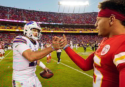 Oct 16, 2022; Kansas City, Missouri, USA; Buffalo Bills quarterback Josh Allen (17) shakes hands with Kansas City Chiefs quarterback Patrick Mahomes (15) after a game at GEHA Field at Arrowhead Stadium. Mandatory Credit: Jay Biggerstaff-USA TODAY Sports