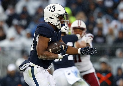 Oct 14, 2023; University Park, Pennsylvania, USA; Penn State Nittany Lions running back Kaytron Allen (13) runs with the ball during the second quarter against the Massachusetts Minutemen at Beaver Stadium. Penn State defeated Massachusetts 63-0. Mandatory Credit: Matthew O'Haren-USA TODAY Sports