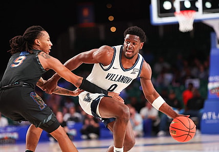 Nov 24, 2023; Paradise Island, BAHAMAS;  Villanova Wildcats guard TJ Bamba (0) controls the ball as Memphis Tigers guard Caleb Mills (9) defends during the first half at Imperial Arena. Mandatory Credit: Kevin Jairaj-USA TODAY Sports