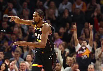 Kevin Durant reacts after hitting a 3-point shot.