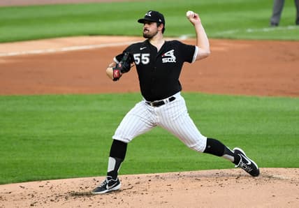 Jul 22, 2020; Chicago, Illinois, USA; Chicago White Sox starting pitcher Carlos Rodon (55) throws a pitch against the Milwaukee Brewers during the second inning at Guaranteed Rate Field. Mandatory Credit: Mike Dinovo-USA TODAY Sports