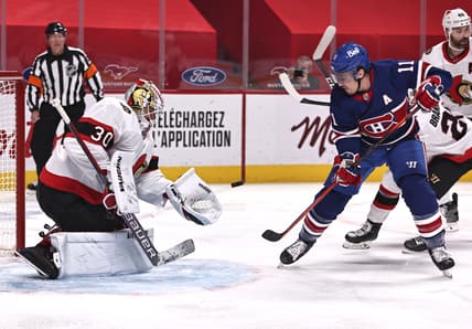 Feb 04, 2021; Montreal, Quebec, CAN; Ottawa Senators goaltender Matt Murray (30) makes a save against Montreal Canadiens right wing Brendan Gallagher (11) during the first period at Bell Centre. Mandatory Credit: Jean-Yves Ahern-USA TODAY Sports