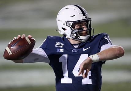 Dec 19, 2020; University Park, Pennsylvania, USA; Penn State Nittany Lions quarterback Sean Clifford (14) warms up on the sideline during the fourth quarter against the Illinois Fighting Illini at Beaver Stadium. Penn State defeated Illinois 56-21. Mandatory Credit: Matthew OHaren-USA TODAY Sports