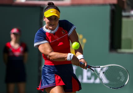 Bianca Andreescu of Canada returns the ball to Anett Kontaveit of Estonia during their round three match of the BNP Paribas Open, Monday, Oct. 11, 2021, in Indian Wells, Calif.