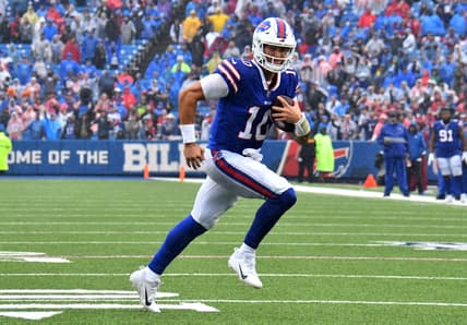 Oct 3, 2021; Orchard Park, New York, USA; Buffalo Bills quarterback Mitchell Trubisky (10) runs for a touchdown in the fourth quarter against the Houston Texans at Highmark Stadium. Mandatory Credit: Mark Konezny-USA TODAY Sports