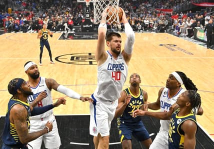 Nov 27, 2022; Los Angeles, California, USA; Los Angeles Clippers center Ivica Zubac (40) grabs a rebound in the first half against the Indiana Pacers at Crypto.com Arena. Mandatory Credit: Jayne Kamin-Oncea-USA TODAY Sports