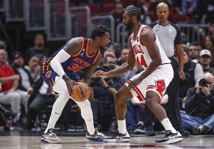 Dec 14, 2022; Chicago, Illinois, USA; Chicago Bulls forward Patrick Williams (44) defends against New York Knicks forward Julius Randle (30) during the first half at United Center. Mandatory Credit: Kamil Krzaczynski-USA TODAY Sports