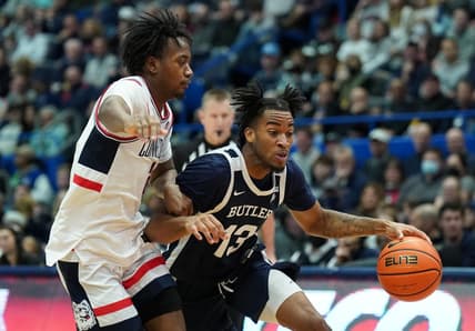Jan 22, 2023; Hartford, Connecticut, USA; Butler Bulldogs guard Jayden Taylor (13) drives the ball against UConn Huskies guard Hassan Diarra (5) in the second half at XL Center. Mandatory Credit: David Butler II-USA TODAY Sports