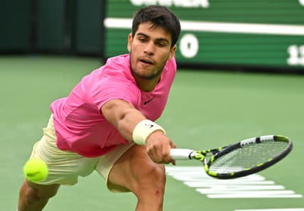 Mar 18, 2023; Indian Wells, CA, USA; Carlos Alcaraz (ESP) hits a shot in the semi final match defeating Jannik Sinner (ITA) in the BNP Paribas Open at the Indian Wells Tennis Garden. Mandatory Credit: Jayne Kamin-Oncea-USA TODAY Sports