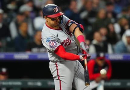 Apr 8, 2023; Denver, Colorado, USA; Washington Nationals first baseman Joey Meneses (45) doubles in the fifth inning against the Colorado Rockies at Coors Field. Mandatory Credit: Ron Chenoy-USA TODAY Sports