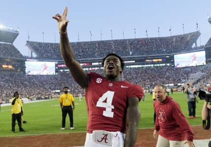 Oct 21, 2023; Tuscaloosa, Alabama, USA;  Alabama Crimson Tide quarterback Jalen Milroe (4) celebrates with fans after the Crimson Tide defeated Tennessee 34-20 at Bryant-Denny Stadium. Mandatory Credit: Gary Cosby Jr.-USA TODAY Sports