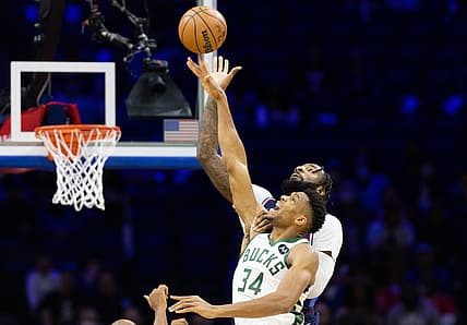 Nov 9, 2021; Philadelphia, Pennsylvania, USA; Milwaukee Bucks forward Giannis Antetokounmpo (34) and Philadelphia 76ers center Andre Drummond (1) compete for a jump ball during the first quarter at Wells Fargo Center. Mandatory Credit: Bill Streicher-USA TODAY Sports