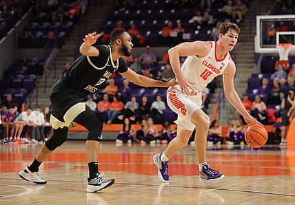 Feb 23, 2022; Clemson, South Carolina, USA; Clemson Tigers forward Ben Middlebrooks (10) moves to the basket as Wake Forest Demon Deacons forward Dallas Walton (13) defends during the first half at Littlejohn Coliseum. Mandatory Credit: Dawson Powers-USA TODAY Sports