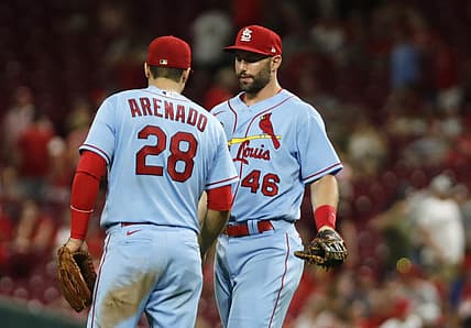 Jul 23, 2022; Cincinnati, Ohio, USA; St. Louis Cardinals first baseman Paul Goldschmidt (46) and third baseman Nolan Arenado (28) react after the Cardinals defeated the Cincinnati Reds at Great American Ball Park. Mandatory Credit: David Kohl-USA TODAY Sports