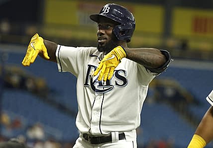 Sep 6, 2022; St. Petersburg, Florida, USA;Tampa Bay Rays left fielder Randy Arozarena (56) celebrates after he hit a three-run home run against the Boston Red Sox during the first inning at Tropicana Field. Mandatory Credit: Kim Klement-USA TODAY Sports