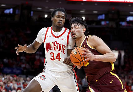 Jan 12, 2023; Columbus, Ohio, USA;  Minnesota Golden Gophers forward Dawson Garcia (3) collides with Ohio State Buckeyes center Felix Okpara (34) during the first half at Value City Arena. Mandatory Credit: Joseph Maiorana-USA TODAY Sports