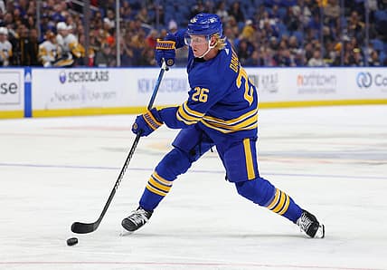 Oct 6, 2023; Buffalo, New York, USA;  Buffalo Sabres defenseman Rasmus Dahlin (26) takes a shot on goal during the second period against the Pittsburgh Penguins at KeyBank Center. Mandatory Credit: Timothy T. Ludwig-USA TODAY Sports