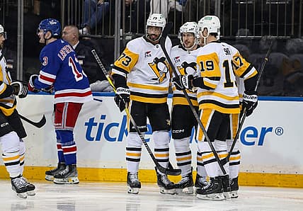 Apr 1, 2024; New York, New York, USA; Pittsburgh Penguins right wing Bryan Rust (17) celebrates his goal with Pittsburgh Penguins center Sidney Crosby (87) during the first period against the New York Rangers at Madison Square Garden. Mandatory Credit: Danny Wild-USA TODAY Sports