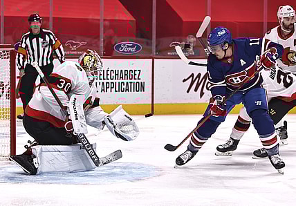 Feb 04, 2021; Montreal, Quebec, CAN; Ottawa Senators goaltender Matt Murray (30) makes a save against Montreal Canadiens right wing Brendan Gallagher (11) during the first period at Bell Centre. Mandatory Credit: Jean-Yves Ahern-USA TODAY Sports