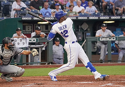 Jul 26, 2021; Kansas City, Missouri, USA; Kansas City Royals designated hitter Jorge Soler (12) connects for a solo home run in the fourth inning against the Chicago White Sox at Kauffman Stadium. Mandatory Credit: Denny Medley-USA TODAY Sports