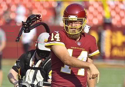 Aug 28, 2021; Landover, Maryland, USA; Washington Football Team quarterback Ryan Fitzpatrick (14) on the field before the game against the Baltimore Ravens at FedExField. Mandatory Credit: Brad Mills-USA TODAY Sports