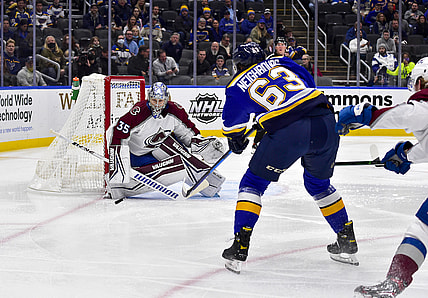 Oct 28, 2021; St. Louis, Missouri, USA;  Colorado Avalanche goaltender Darcy Kuemper (35) defends the net against St. Louis Blues left wing Jake Neighbours (63) during the first period at Enterprise Center. Mandatory Credit: Jeff Curry-USA TODAY Sports