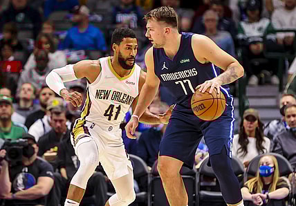 Nov 8, 2021; Dallas, Texas, USA; Dallas Mavericks guard Luka Doncic (77) controls the ball as New Orleans Pelicans forward Garrett Temple (41) defends during the first quarter at American Airlines Center. Mandatory Credit: Kevin Jairaj-USA TODAY Sports