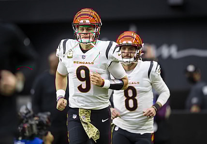 Nov 21, 2021; Paradise, Nevada, USA; Cincinnati Bengals quarterback Joe Burrow (9) and Brandon Allen (8) against the Las Vegas Raiders at Allegiant Stadium. Mandatory Credit: Mark J. Rebilas-USA TODAY Sports