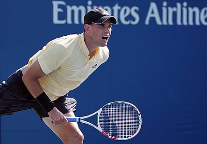 Aug 29, 2022; Flushing, NY, USA;  Dominic Thiem of Austria serves during his match against Pablo Carreno Busta of Spain on day one of the 2022 U.S. Open tennis tournament at USTA Billie Jean King National Tennis Center. Mandatory Credit: Jerry Lai-USA TODAY Sports