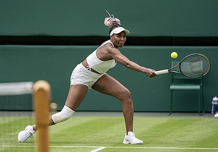 Jul 3, 2023; London, United Kingdom; Elina Svitolina (UKR) returns the ball against Venus Williams (USA) at the All England Lawn Tennis and Croquet Club. Mandatory Credit: Susan Mullane-USA TODAY Sports