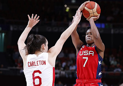 Sep 30, 2022; Sydney, AUS; USA player Ariel Atkins (7) makes a shot against Canada player Bridget Carleton (6) in the second quarter at Sydney SuperDome. Mandatory Credit: Yukihito Taguchi-USA TODAY Sports