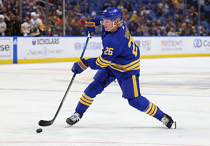Oct 6, 2023; Buffalo, New York, USA;  Buffalo Sabres defenseman Rasmus Dahlin (26) takes a shot on goal during the second period against the Pittsburgh Penguins at KeyBank Center. Mandatory Credit: Timothy T. Ludwig-USA TODAY Sports