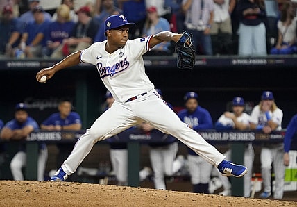Oct 27, 2023; Arlington, TX, USA; Texas Rangers pitcher Jose Leclerc (25) throws during the tenth inning in game one of the 2023 World Series against the Arizona Diamondbacks at Globe Life Field.  Mandatory Credit: Raymond Carlin III-USA TODAY Sports