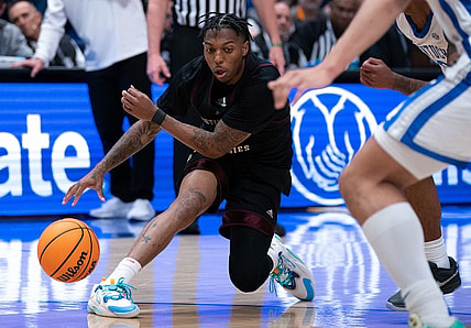 Texas A&M Aggies guard Wade Taylor IV (4) handles the ball against Kentucky during their SEC Men's Basketball Tournament quarterfinal game at Bridgestone Arena in Nashville, Tenn., Friday, March 15, 2024 at Bridgestone Arena in Nashville, Tenn., Friday, March 15, 2024.