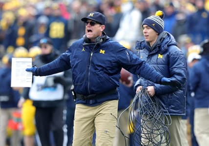 Michigan coach Jim Harbaugh reacts during game