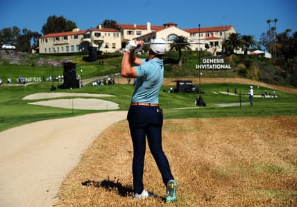 Feb 19, 2021; Pacific Palisades, California, USA; Sam Burns plays his shot on the rough of the ninth hole course during the second round of The Genesis Invitational golf tournament at Riviera Country Club. Mandatory Credit: Gary A. Vasquez-USA TODAY Sports